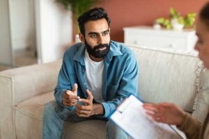man in a therapy session learns about maple leaf counseling services
